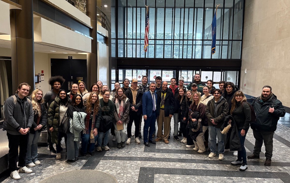 A photo of a group of architecture students and faculty at the State Capitol