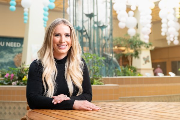 Alissa Adams sitting at a table